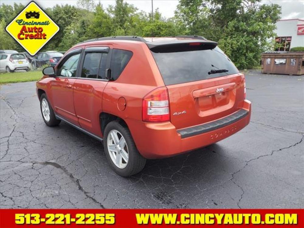 2010 Sunburst Orange Pearl Coat Jeep Compass Sport (1J4NF4FB3AD) with an 2.4L 2.4L I4 172hp 165ft. lbs. Sequential Multiport Fuel Injection engine, Other transmission, located at 5489 Dixie Highway, Fairfield, OH, 45014, (513) 221-2255, 39.333084, -84.523834 - Photo #2