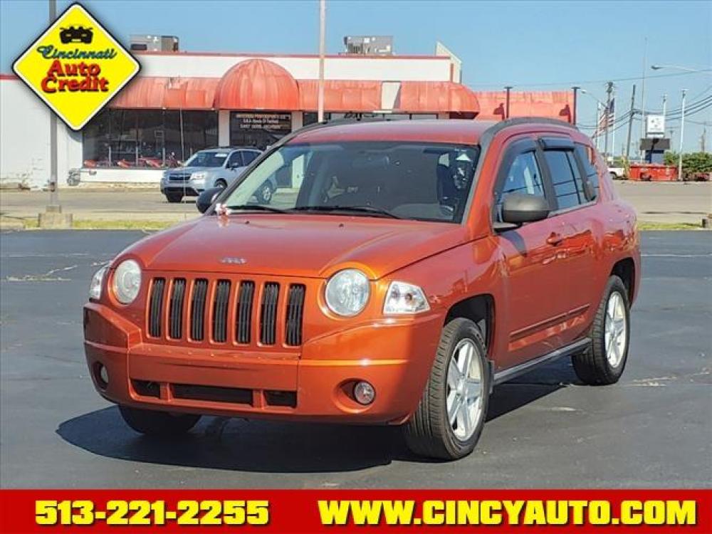 2010 Sunburst Orange Pearl Coat Jeep Compass Sport (1J4NF4FB3AD) with an 2.4L 2.4L I4 172hp 165ft. lbs. Sequential Multiport Fuel Injection engine, Other transmission, located at 5489 Dixie Highway, Fairfield, OH, 45014, (513) 221-2255, 39.333084, -84.523834 - Photo #0