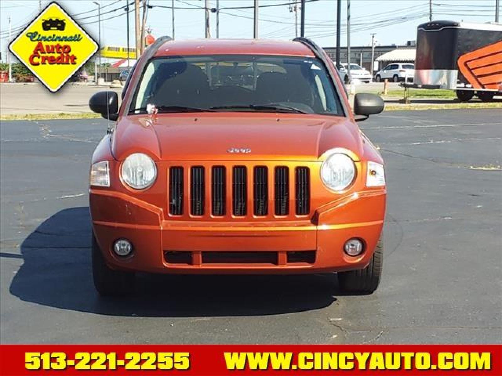 2010 Sunburst Orange Pearl Coat Jeep Compass Sport (1J4NF4FB3AD) with an 2.4L 2.4L I4 172hp 165ft. lbs. Sequential Multiport Fuel Injection engine, 5-Speed Manual transmission, located at 5489 Dixie Highway, Fairfield, OH, 45014, (513) 221-2255, 39.333084, -84.523834 - Photo #1