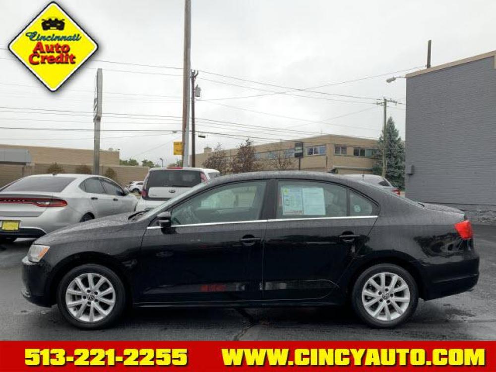 2014 Black Uni Volkswagen Jetta SE PZEV (3VWD17AJXEM) with an 1.8 4 Cylinder Direct Injection engine, Automatic transmission, located at 2813 Gilbert Avenue, Cincinnati, OH, 45206, (513) 221-2255, 39.130219, -84.489189 - Photo #1