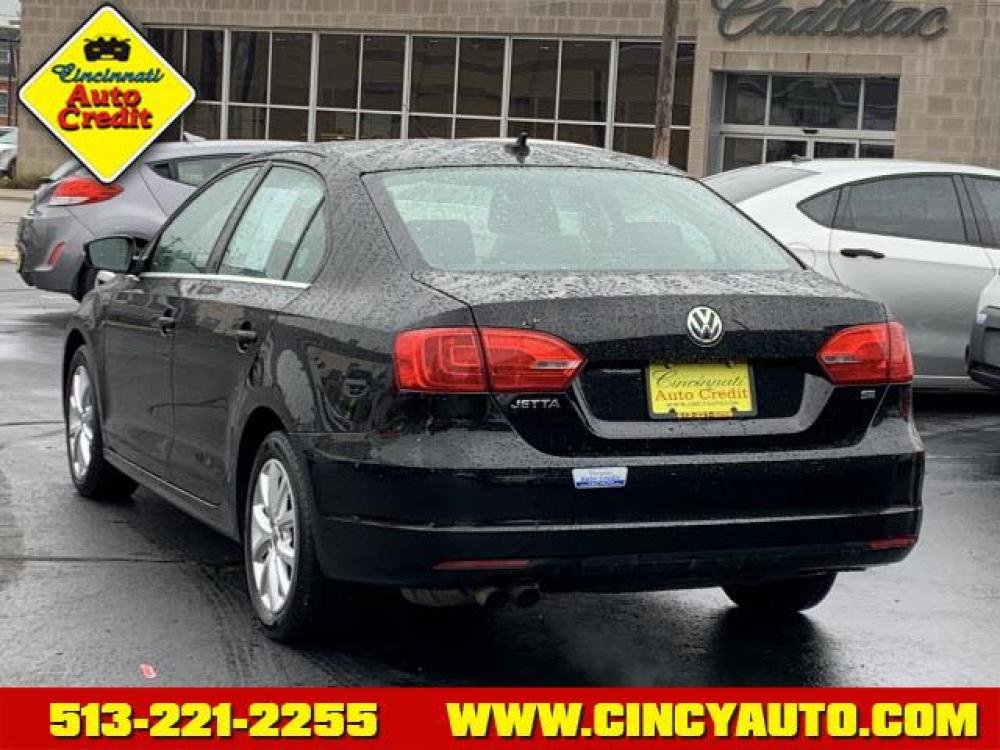 2014 Black Uni Volkswagen Jetta SE PZEV (3VWD17AJXEM) with an 1.8 4 Cylinder Direct Injection engine, Automatic transmission, located at 2813 Gilbert Avenue, Cincinnati, OH, 45206, (513) 221-2255, 39.130219, -84.489189 - Photo #2
