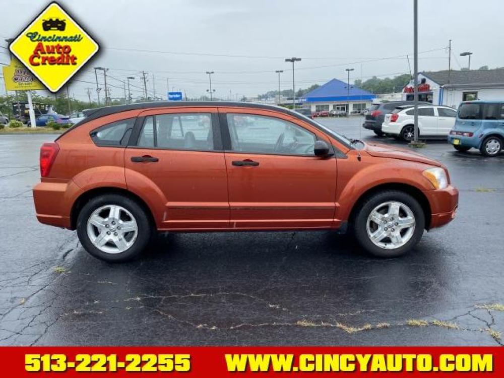 2007 Sunburst Orange Pearlcoat Dodge Caliber SXT (1B3HB48B27D) with an 2.0 4 Cylinder Fuel Injected engine, Automatic transmission, located at 5489 Dixie Highway, Fairfield, OH, 45014, (513) 221-2255, 39.333084, -84.523834 - Photo #1