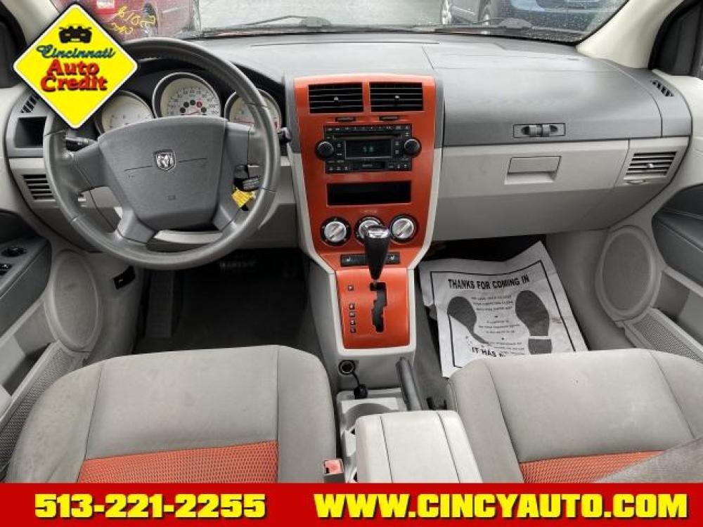 2007 Sunburst Orange Pearlcoat Dodge Caliber SXT (1B3HB48B27D) with an 2.0 4 Cylinder Fuel Injected engine, Automatic transmission, located at 5489 Dixie Highway, Fairfield, OH, 45014, (513) 221-2255, 39.333084, -84.523834 - Photo #3
