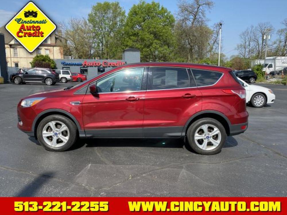 2013 Ruby Red Metallic Tinted Clear Coat Ford Escape SE (1FMCU0GX9DU) with an 1.6 4 Cylinder Direct Injection engine, Automatic transmission, located at 2813 Gilbert Avenue, Cincinnati, OH, 45206, (513) 221-2255, 39.130219, -84.489189 - Photo #1