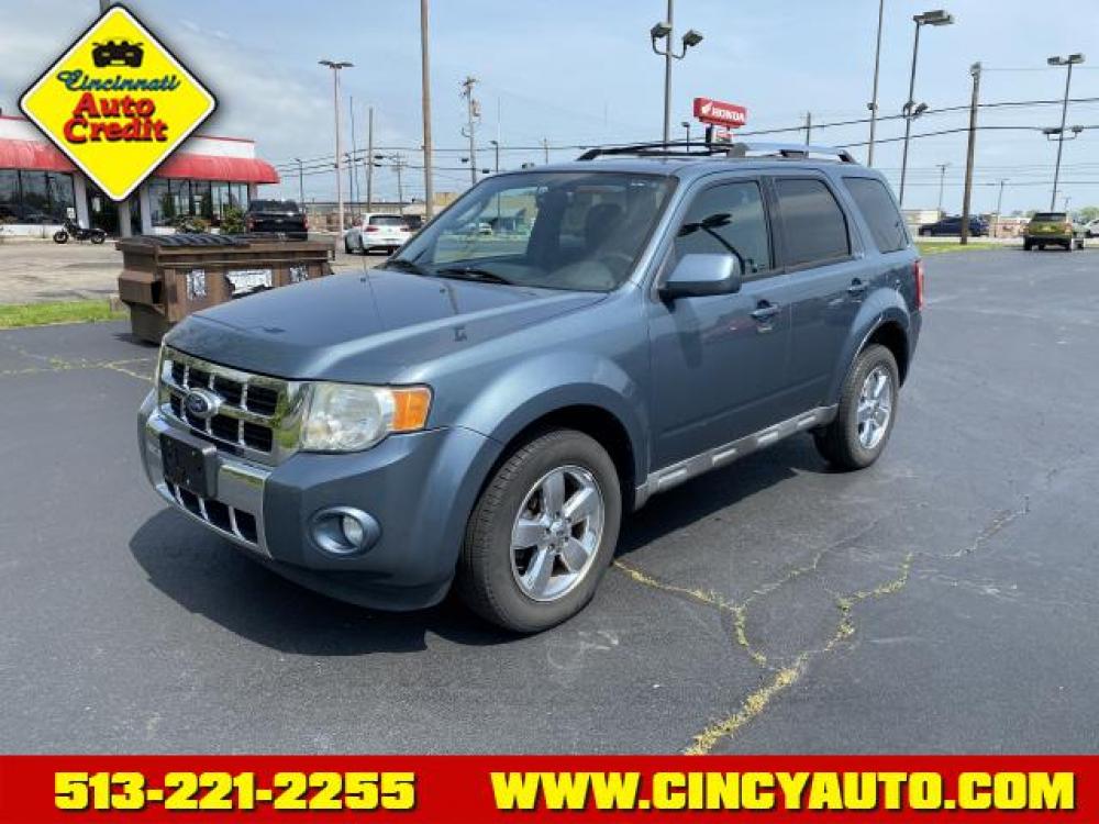 2010 Steel Blue Metallic Ford Escape Limited (1FMCU0EG0AK) with an 3.0 6 Cylinder Sequential Multiport Fuel Injection engine, Automatic transmission, located at 5489 Dixie Highway, Fairfield, OH, 45014, (513) 221-2255, 39.333084, -84.523834 - Photo #0