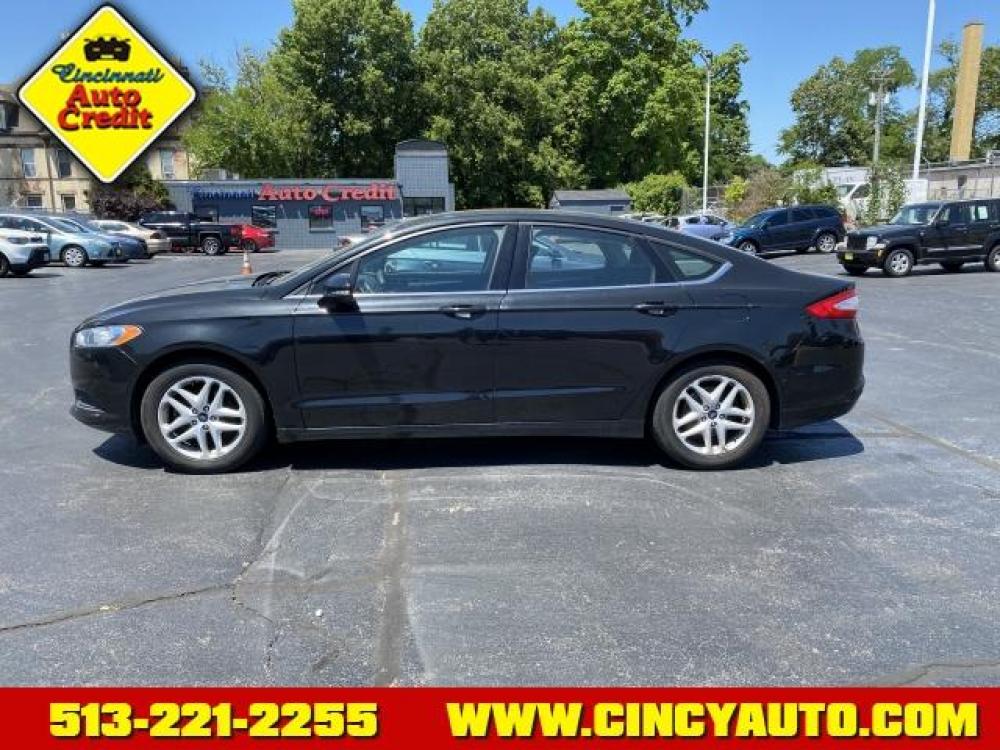 2014 Tuxedo Black Metallic Ford Fusion SE (1FA6P0H74E5) with an 2.5 4 Cylinder Sequential Multiport Fuel Injection engine, Automatic transmission, located at 2813 Gilbert Avenue, Cincinnati, OH, 45206, (513) 221-2255, 39.130219, -84.489189 - Photo #1