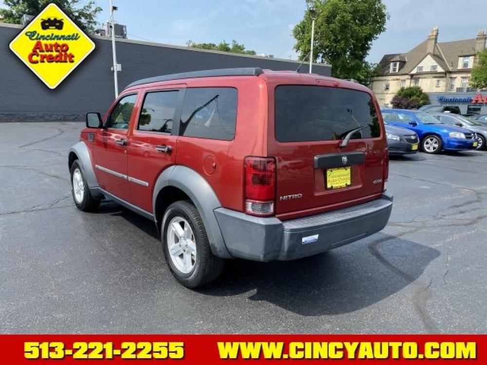 2007 Inferno Red Crystal Pearlcoat Dodge Nitro SXT (1D8GU28K87W) with an 3.7 6 Cylinder Fuel Injected engine, Automatic transmission, located at 2813 Gilbert Avenue, Cincinnati, OH, 45206, (513) 221-2255, 39.130219, -84.489189 - Photo #2