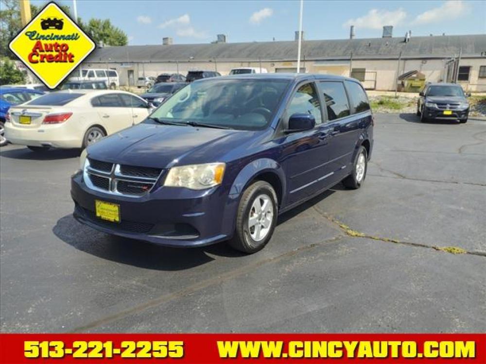 2013 Blue Streak Pearl Coat Dodge Grand Caravan SXT (2C4RDGCG6DR) with an 3.6L Pentastar 3.6L V6 283hp 2 Sequential Multiport Fuel Injection engine, 6-Speed Shiftable Automatic transmission, located at 2813 Gilbert Avenue, Cincinnati, OH, 45206, (513) 221-2255, 39.130219, -84.489189 - Photo #0