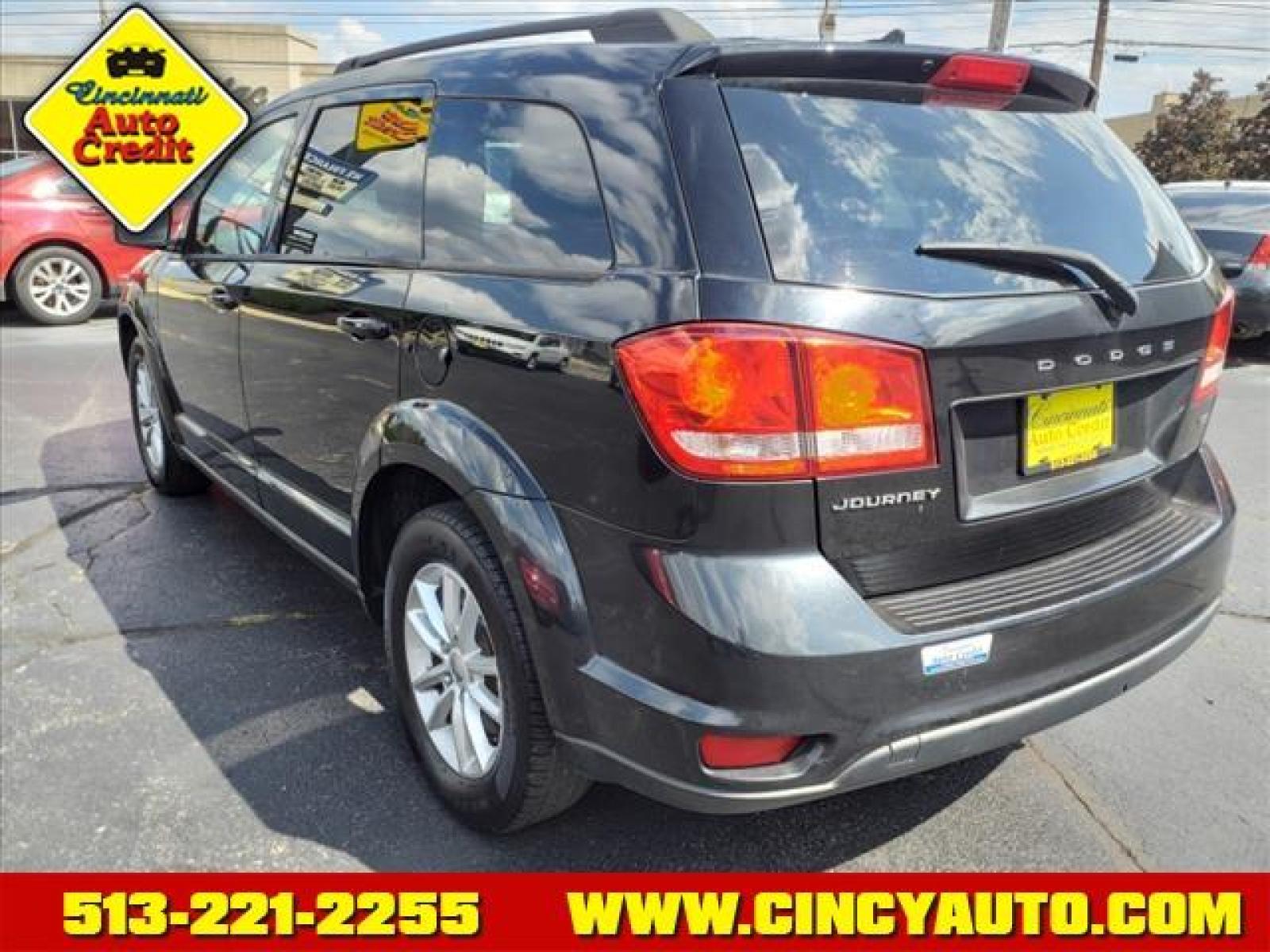 2013 Brilliant Black Crystal Pearl Coat Dodge Journey SXT (3C4PDCBB4DT) with an 2.4L 2.4L I4 173hp 166ft. lbs. Sequential Multiport Fuel Injection engine, 4-Speed Shiftable Automatic transmission, located at 2813 Gilbert Avenue, Cincinnati, OH, 45206, (513) 221-2255, 39.130219, -84.489189 - Photo #2