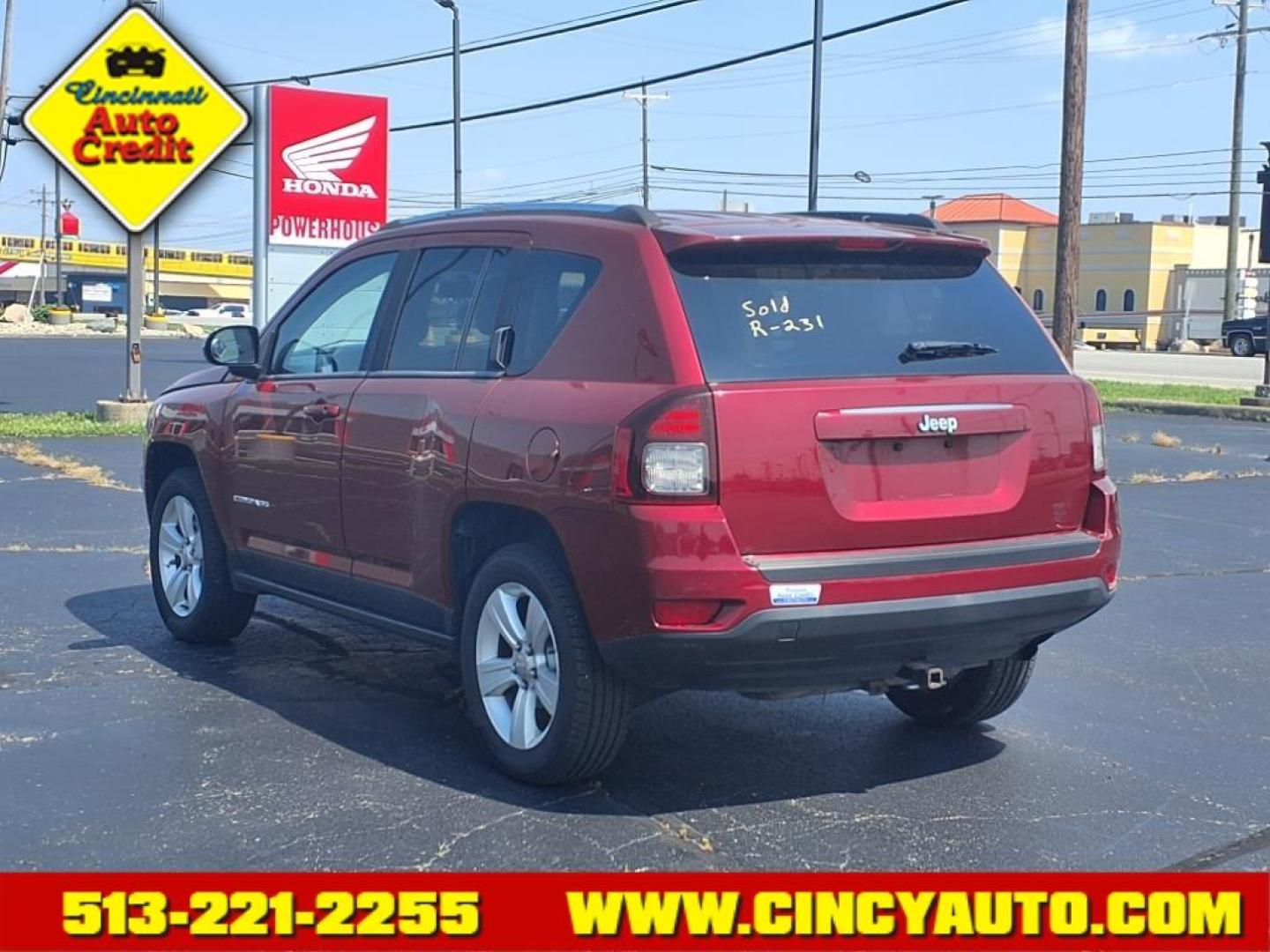 2014 Deep Cherry Red Crystal Pearl Coat Jeep Compass Sport (1C4NJCBB5ED) with an 2.4L 2.4L I4 172hp 165ft. lbs. Sequential Multiport Fuel Injection engine, 6-Speed Shiftable Automatic transmission, located at 5489 Dixie Highway, Fairfield, OH, 45014, (513) 221-2255, 39.333084, -84.523834 - Photo#2