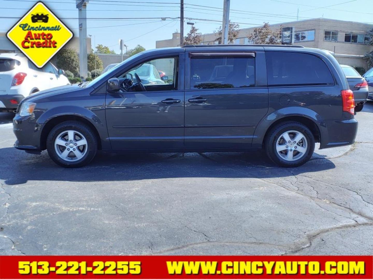 2012 Dark Charcoal Pearl Coat Dodge Grand Caravan SXT (2C4RDGCG6CR) with an 3.6L Pentastar 3.6L Flex Fuel V6 283hp 260ft. lbs. Sequential Multiport Fuel Injection engine, 6-Speed Shiftable Automatic transmission, located at 2813 Gilbert Avenue, Cincinnati, OH, 45206, (513) 221-2255, 39.130219, -84.489189 - Photo#1
