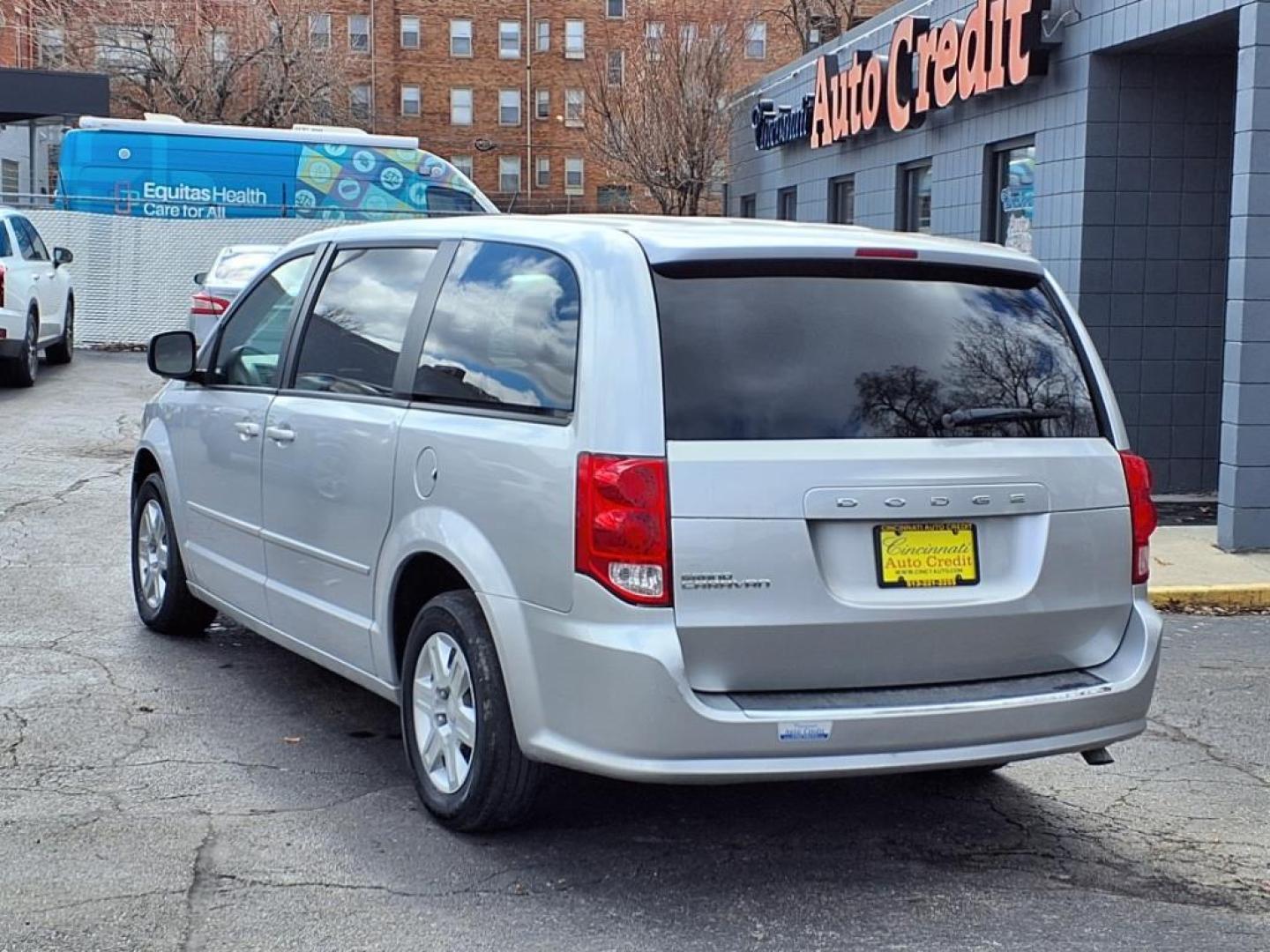 2012 Bright Silver Metallic Clear Coat Ps2 Dodge Grand Caravan SE (2C4RDGBG0CR) with an 3.6L Pentastar 3.6L Flex Fuel V6 283hp 260ft. lbs. Sequential Multiport Fuel Injection engine, 6-Speed Shiftable Automatic transmission, located at 2813 Gilbert Avenue, Cincinnati, OH, 45206, (513) 221-2255, 39.130219, -84.489189 - Photo#2