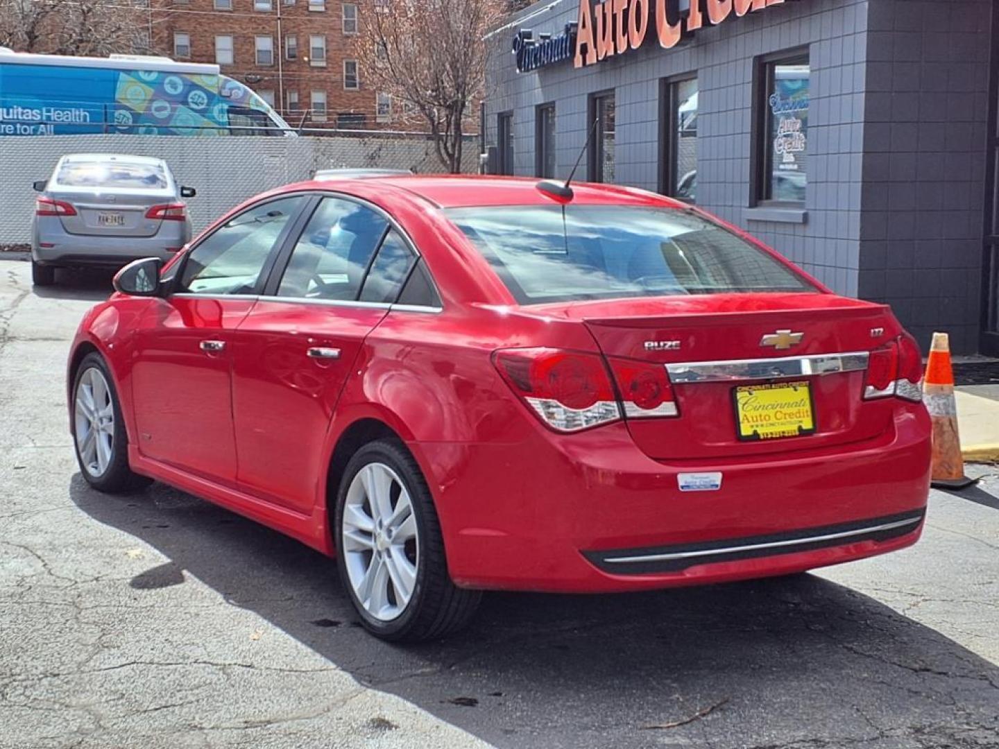 2015 Red Hot G7c Chevrolet Cruze LTZ Auto (1G1PG5SB2F7) with an 1.4L Ecotec 1.4L Turbo I4 138hp 148ft. lbs. Sequential Multiport Fuel Injection engine, 6-Speed Shiftable Automatic w/Overdrive transmission, located at 2813 Gilbert Avenue, Cincinnati, OH, 45206, (513) 221-2255, 39.130219, -84.489189 - Photo#2