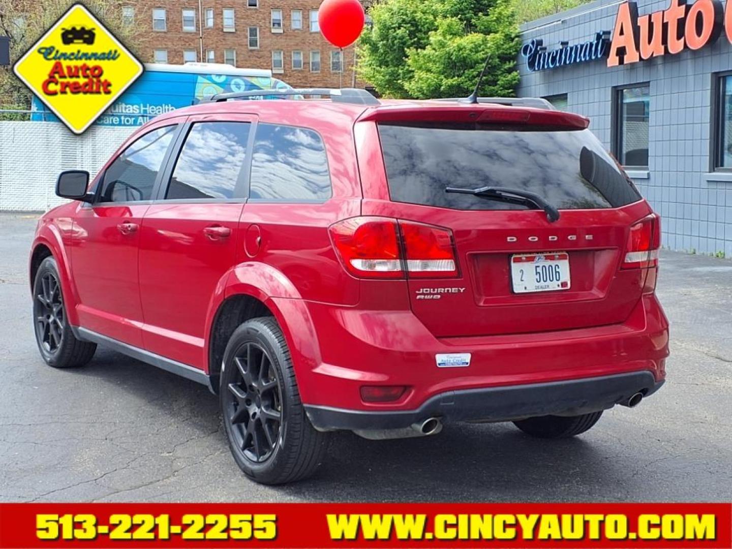 2013 Bright Red Clear Coat Pr1 Dodge Journey SXT (3C4PDDBG1DT) with an 3.6L Pentastar 3.6L V6 283hp 260ft. lbs. Sequential Multiport Fuel Injection engine, 6-Speed Shiftable Automatic transmission, located at 2813 Gilbert Avenue, Cincinnati, OH, 45206, (513) 221-2255, 39.130219, -84.489189 - Photo#2