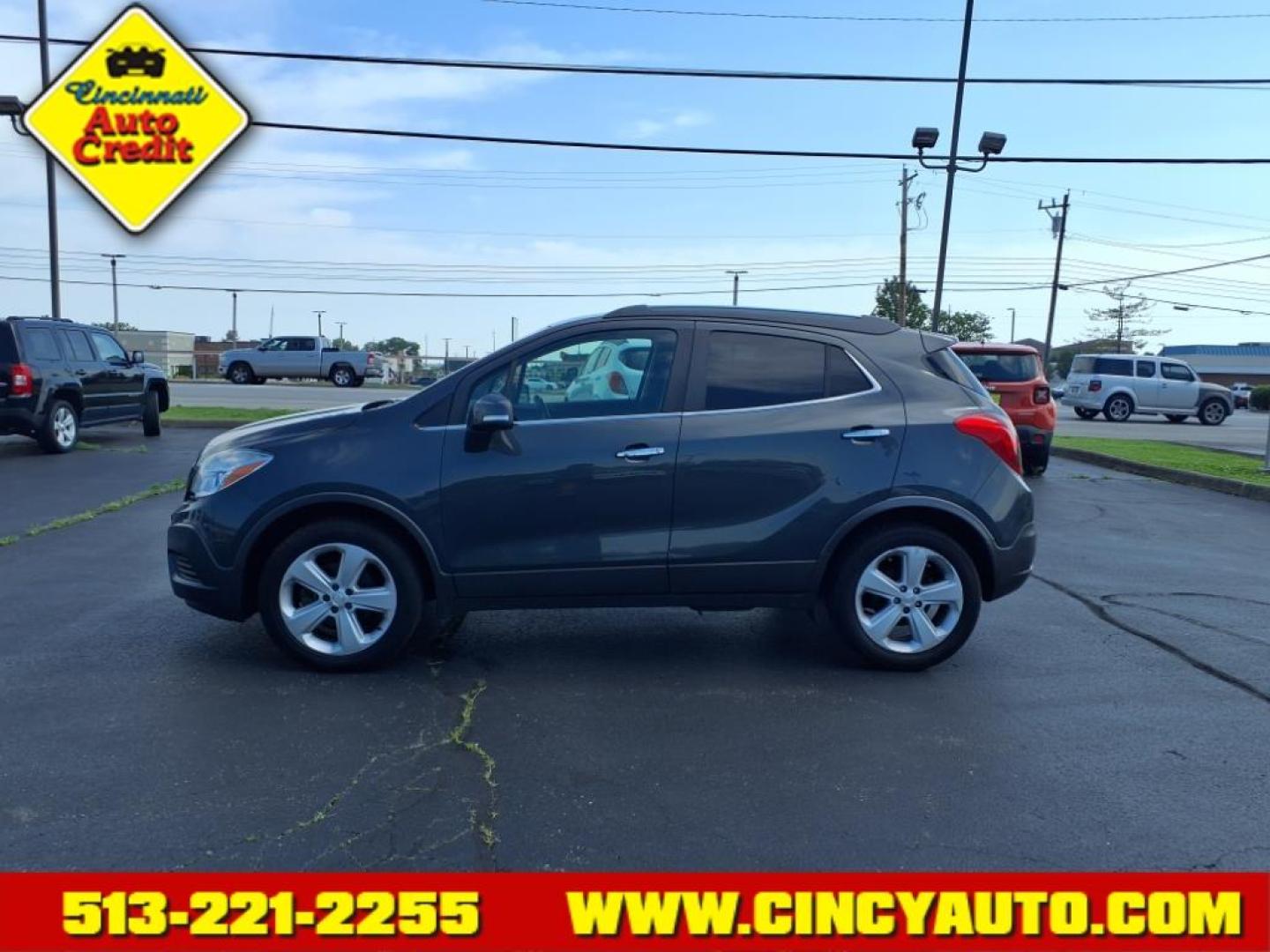 2016 River Rock Metallic/Dark Cocoa Ash Buick Encore Base (KL4CJESB0GB) with an 1.4L Ecotec 1.4L Turbo I4 138hp 148ft. lbs. Sequential Multiport Fuel Injection engine, 6-Speed Automatic w/Driver Shift Control transmission, located at 5489 Dixie Highway, Fairfield, OH, 45014, (513) 221-2255, 39.333084, -84.523834 - Photo#1