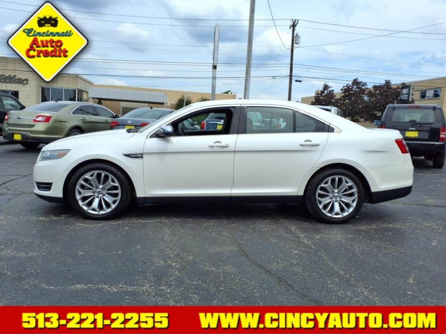 2013 White Platinum Metallic Tri-Coat Ford Taurus Limited (1FAHP2F81DG) with an 3.5L 3.5L V6 288hp 254ft. lbs. Direct Injection engine, 6-Speed Shiftable Automatic transmission, located at 2813 Gilbert Avenue, Cincinnati, OH, 45206, (513) 221-2255, 39.130219, -84.489189 - Photo#1