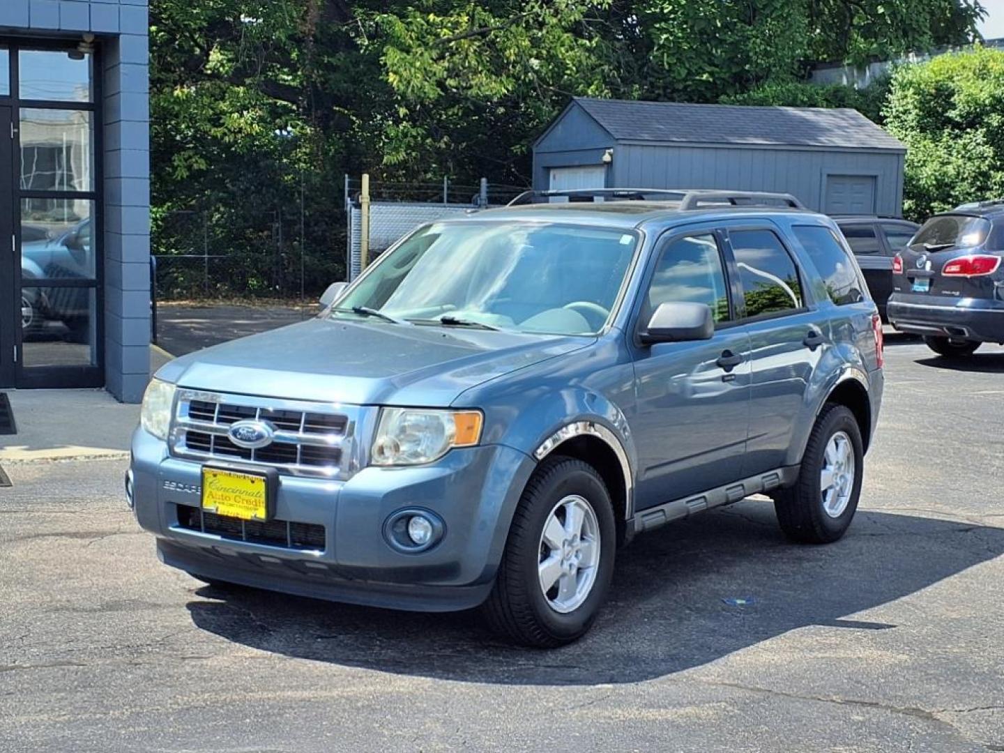 2012 Steel Blue Metallic Ford Escape XLT (1FMCU9DG2CK) with an 3.0L 3.0L Flex Fuel V6 240hp 223ft. lbs. Sequential Multiport Fuel Injection engine, 6-Speed Automatic transmission, located at 2813 Gilbert Avenue, Cincinnati, OH, 45206, (513) 221-2255, 39.130219, -84.489189 - Photo#0