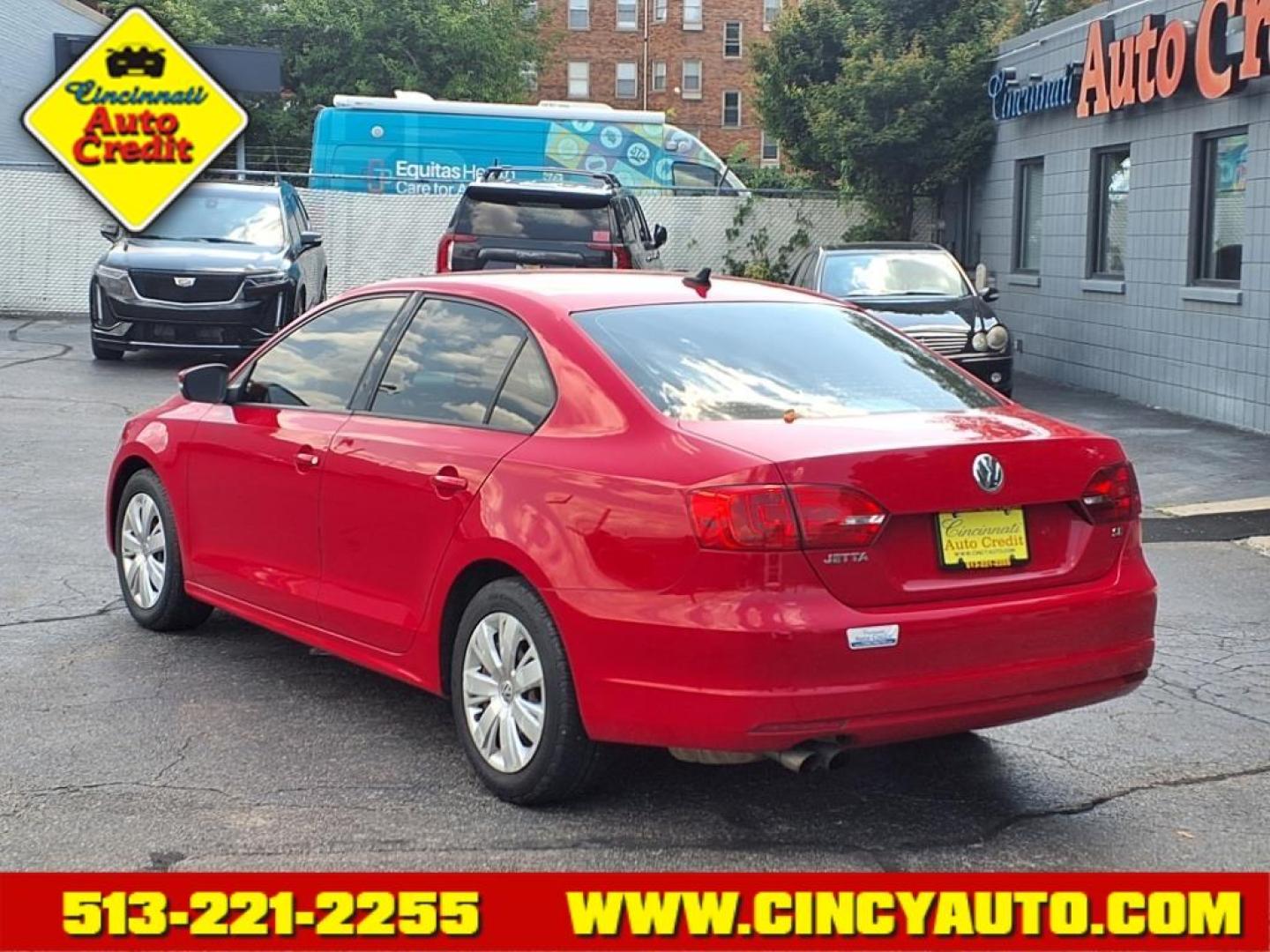2014 Tornado Red G2g2 Volkswagen Jetta SE PZEV (3VWD17AJXEM) with an 1.8L 1.8L Turbo I4 170hp 184ft. lbs. PZEV Direct Injection engine, 6-Speed Shiftable Automatic transmission, located at 2813 Gilbert Avenue, Cincinnati, OH, 45206, (513) 221-2255, 39.130219, -84.489189 - Photo#2