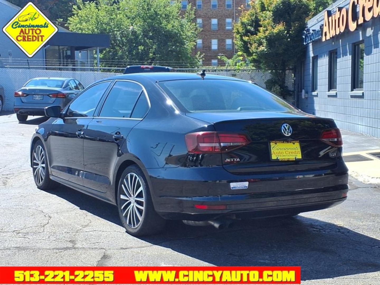 2016 Black Uni Volkswagen Jetta 1.8T Sport (3VWD17AJ3GM) with an 1.8L 1.8L Turbo I4 170hp 184ft. lbs. PZEV Direct Injection engine, 6-Speed Shiftable Automatic transmission, located at 2813 Gilbert Avenue, Cincinnati, OH, 45206, (513) 221-2255, 39.130219, -84.489189 - Photo#2