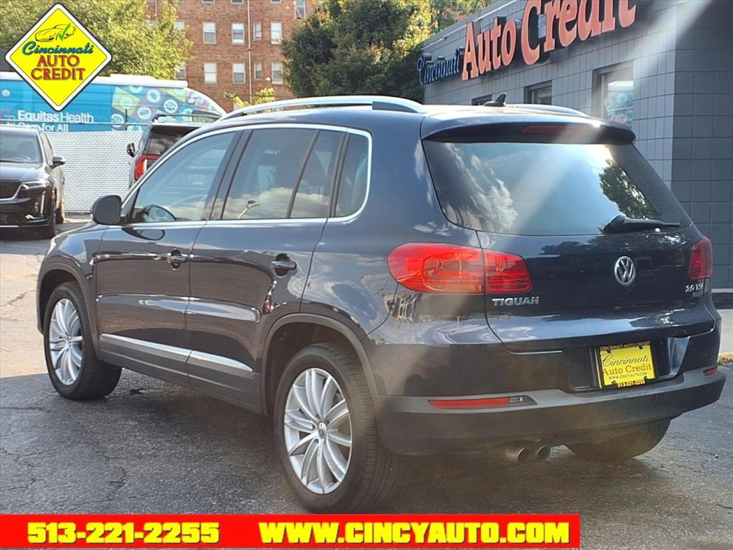 2013 Dk. Blue Volkswagen Tiguan SE 4Motion (WVGBV7AX4DW) with an 2.0L 2.0L Turbo I4 200hp 207ft. lbs. Direct Injection engine, 6-speed Automatic with Tiptronic transmission, located at 2813 Gilbert Avenue, Cincinnati, OH, 45206, (513) 221-2255, 39.130219, -84.489189 - Photo#2