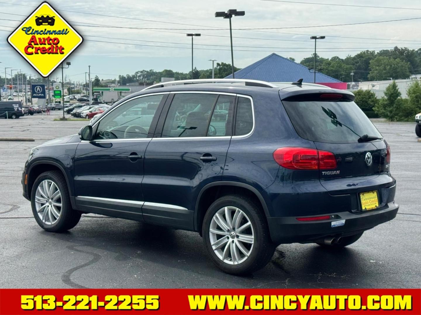 2013 Night Blue Metallic Volkswagen Tiguan SEL 4Motion (WVGBV7AX4DW) with an 2.0L 2.0L Turbo I4 200hp 207ft. lbs. Direct Injection engine, 6-speed Automatic with Tiptronic transmission, located at 5489 Dixie Highway, Fairfield, OH, 45014, (513) 221-2255, 39.333084, -84.523834- Photo#2