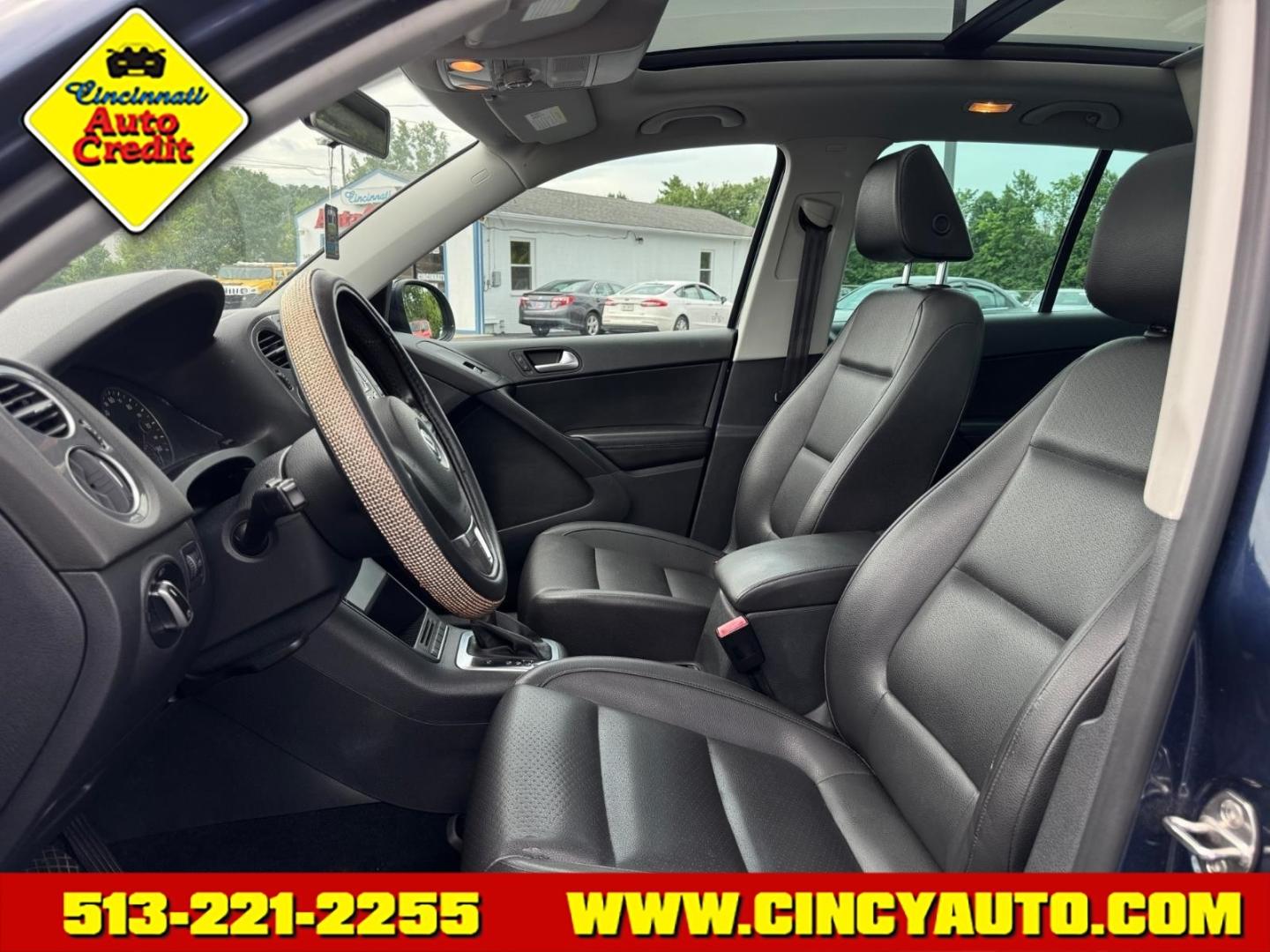 2013 Night Blue Metallic Volkswagen Tiguan SEL 4Motion (WVGBV7AX4DW) with an 2.0L 2.0L Turbo I4 200hp 207ft. lbs. Direct Injection engine, 6-speed Automatic with Tiptronic transmission, located at 5489 Dixie Highway, Fairfield, OH, 45014, (513) 221-2255, 39.333084, -84.523834- Photo#5