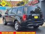 2014 Crystal Black Pearl Honda Pilot EX-L (5FNYF4H57EB) with an 3.5L 3.5L V6 250hp 253ft. lbs. Sequential Multiport Fuel Injection engine, 5-Speed Automatic transmission, located at 2813 Gilbert Avenue, Cincinnati, OH, 45206, (513) 221-2255, 39.130219, -84.489189 - Photo#2