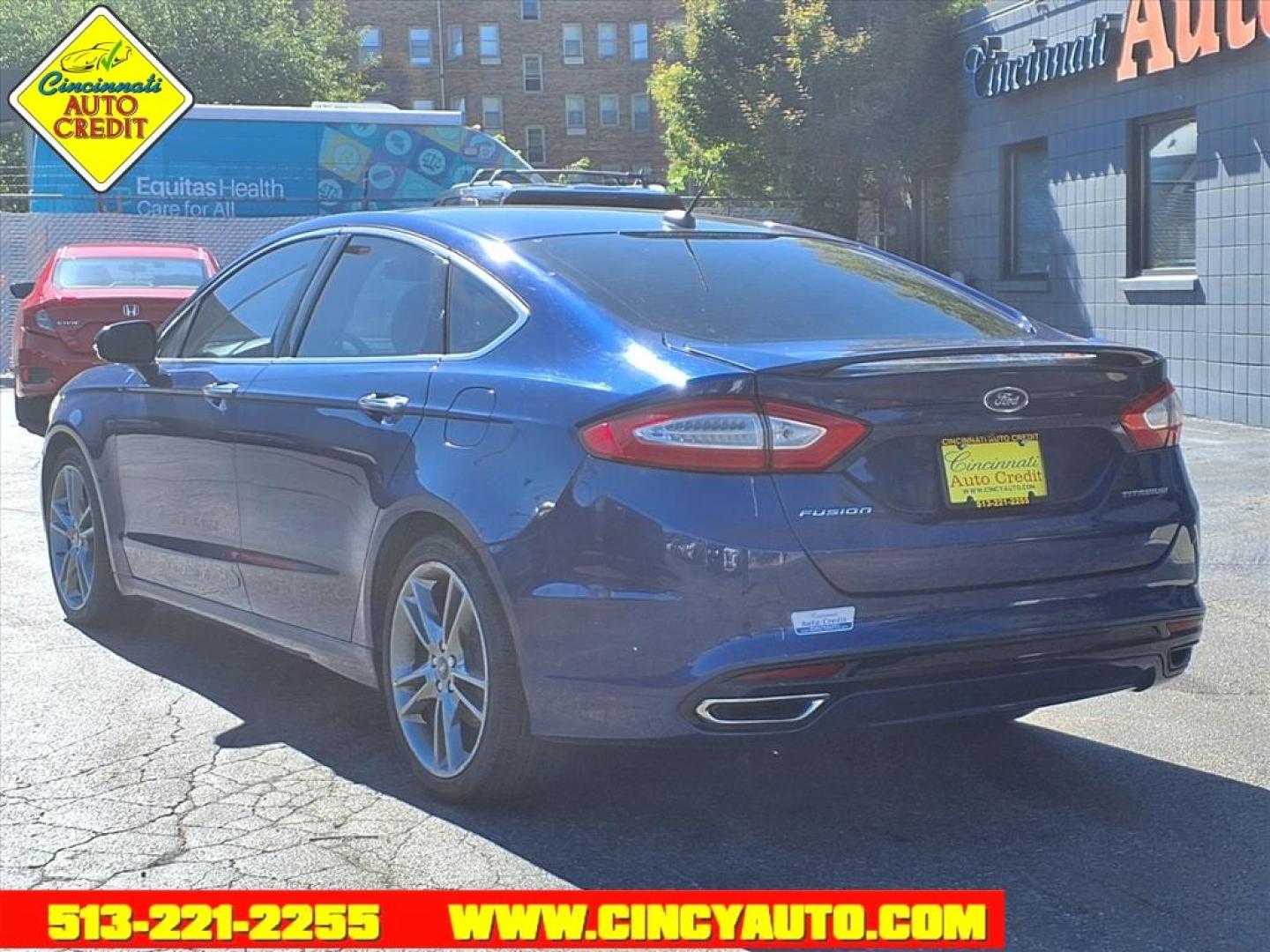 2013 Deep Impact Blue Metallic Ford Fusion Titanium (3FA6P0K93DR) with an 2.0L EcoBoost 2.0L Turbo I4 240hp 270ft. lbs. Direct Injection engine, 6-Speed Shiftable Automatic transmission, located at 2813 Gilbert Avenue, Cincinnati, OH, 45206, (513) 221-2255, 39.130219, -84.489189 - Photo#2