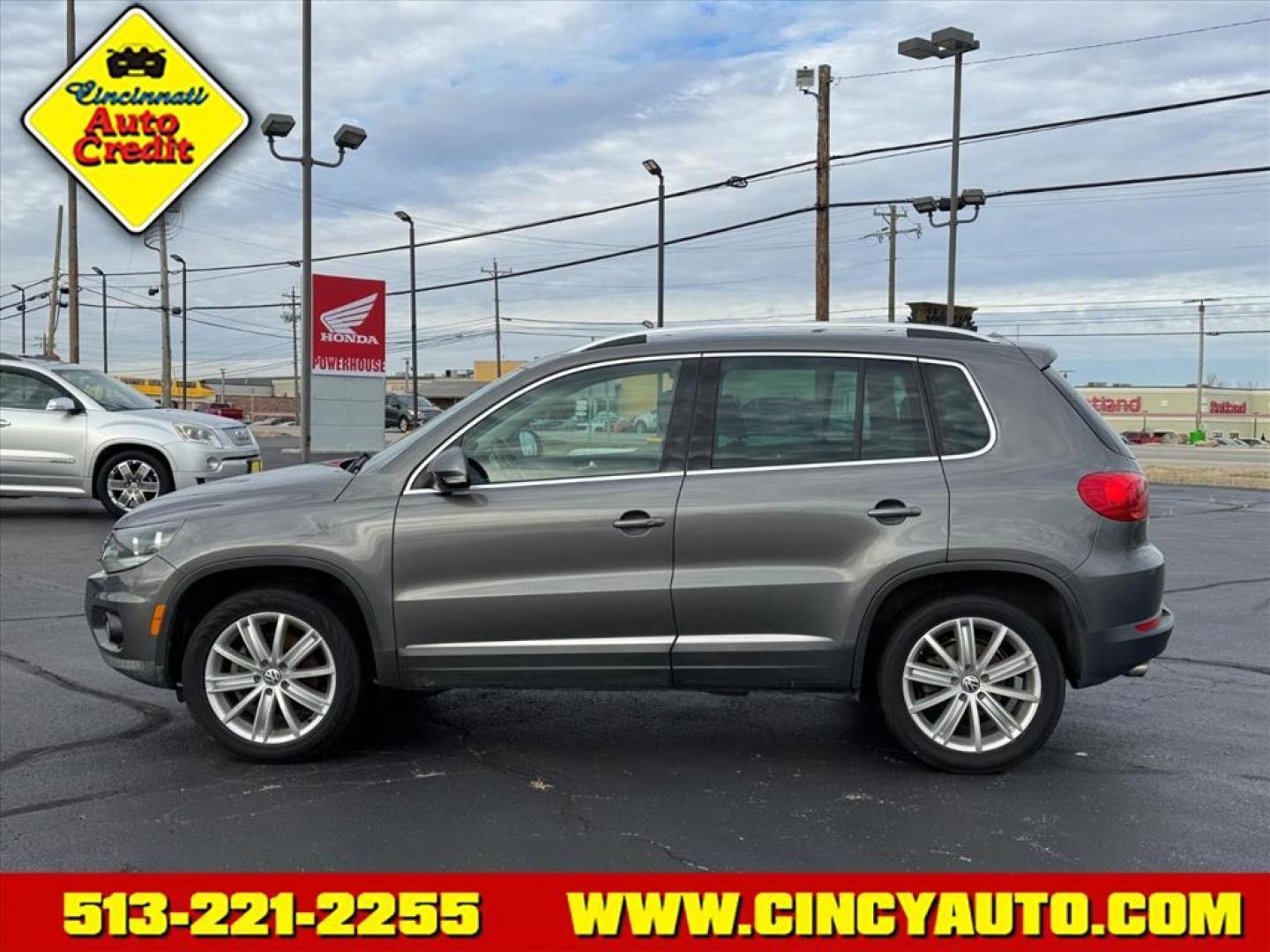 2014 Pepper Gray U5u5 Volkswagen Tiguan SEL (WVGAV3AXXEW) with an 2.0L 2.0L Turbo I4 200hp 207ft. lbs. Direct Injection engine, 6-speed Automatic with Tiptronic transmission, located at 5489 Dixie Highway, Fairfield, OH, 45014, (513) 221-2255, 39.333084, -84.523834 - Photo#1