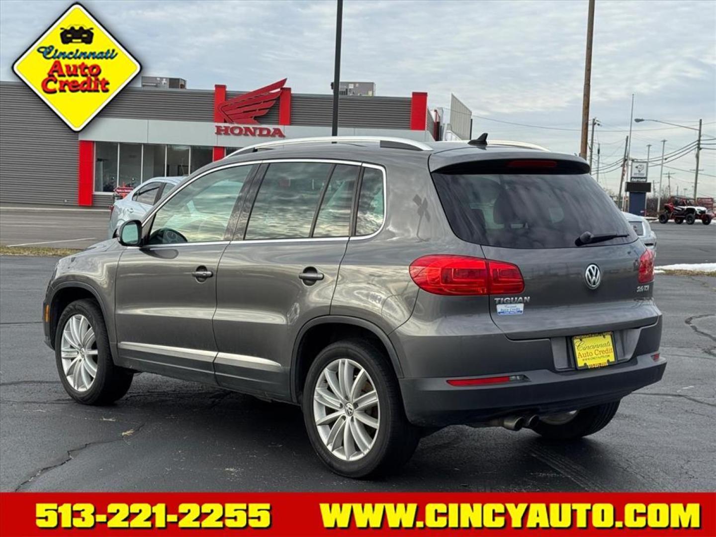 2014 Pepper Gray U5u5 Volkswagen Tiguan SEL (WVGAV3AXXEW) with an 2.0L 2.0L Turbo I4 200hp 207ft. lbs. Direct Injection engine, 6-speed Automatic with Tiptronic transmission, located at 5489 Dixie Highway, Fairfield, OH, 45014, (513) 221-2255, 39.333084, -84.523834 - Photo#2