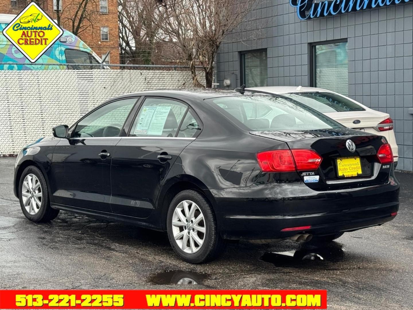 2013 Black Uni Volkswagen Jetta SE PZEV (3VWDP7AJ4DM) with an 2.5L 2.5L I5 170hp 177ft. lbs. PZEV Sequential Multiport Fuel Injection engine, 6-Speed Shiftable Automatic transmission, located at 2813 Gilbert Avenue, Cincinnati, OH, 45206, (513) 221-2255, 39.130219, -84.489189 - Photo#2