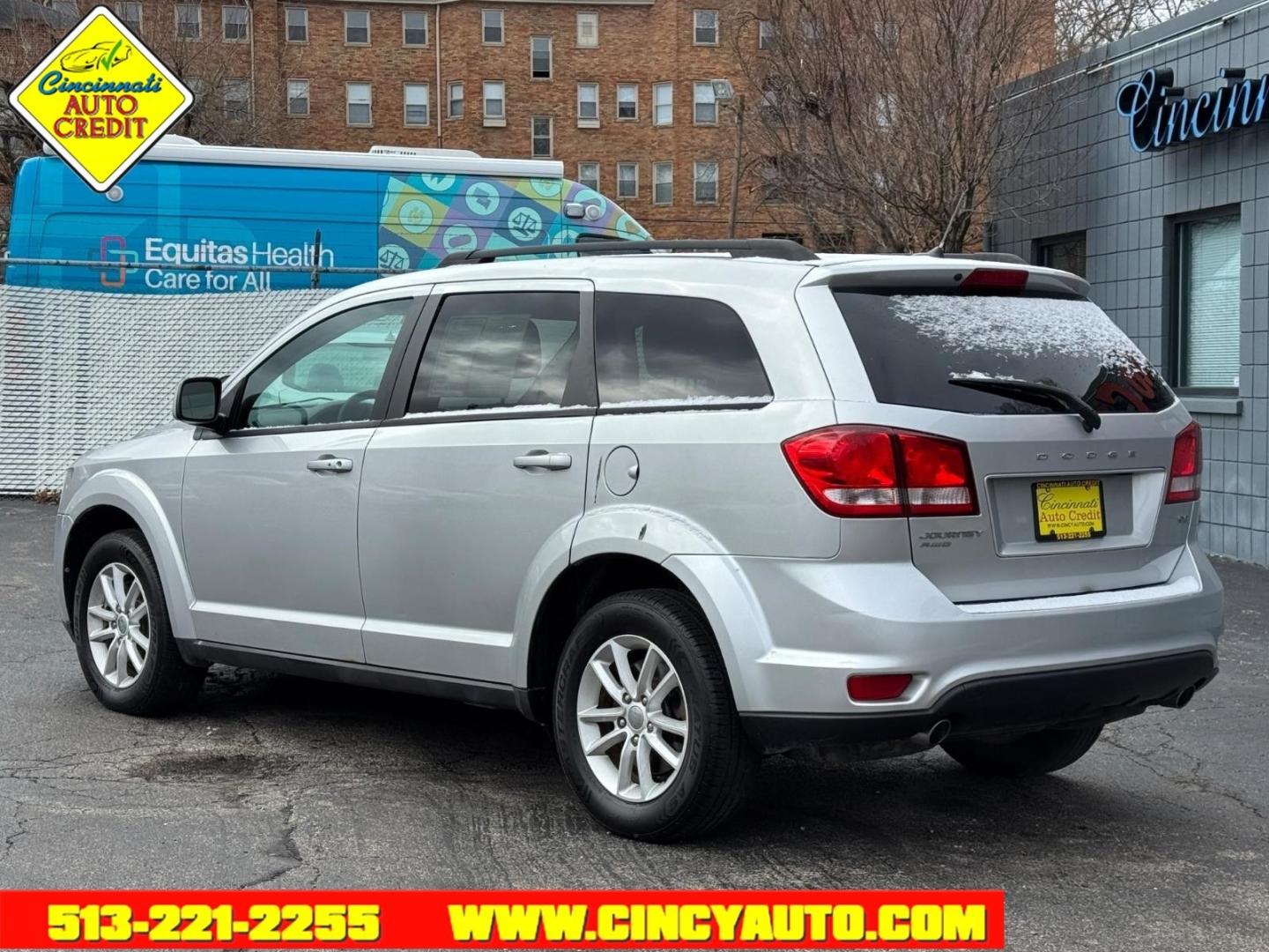 2013 Bright Silver Metallic Clear Coat Dodge Journey SXT (3C4PDDBG3DT) with an 3.6L Pentastar 3.6L V6 283hp 260ft. lbs. Sequential Multiport Fuel Injection engine, 6-Speed Shiftable Automatic transmission, located at 2813 Gilbert Avenue, Cincinnati, OH, 45206, (513) 221-2255, 39.130219, -84.489189 - Photo#2