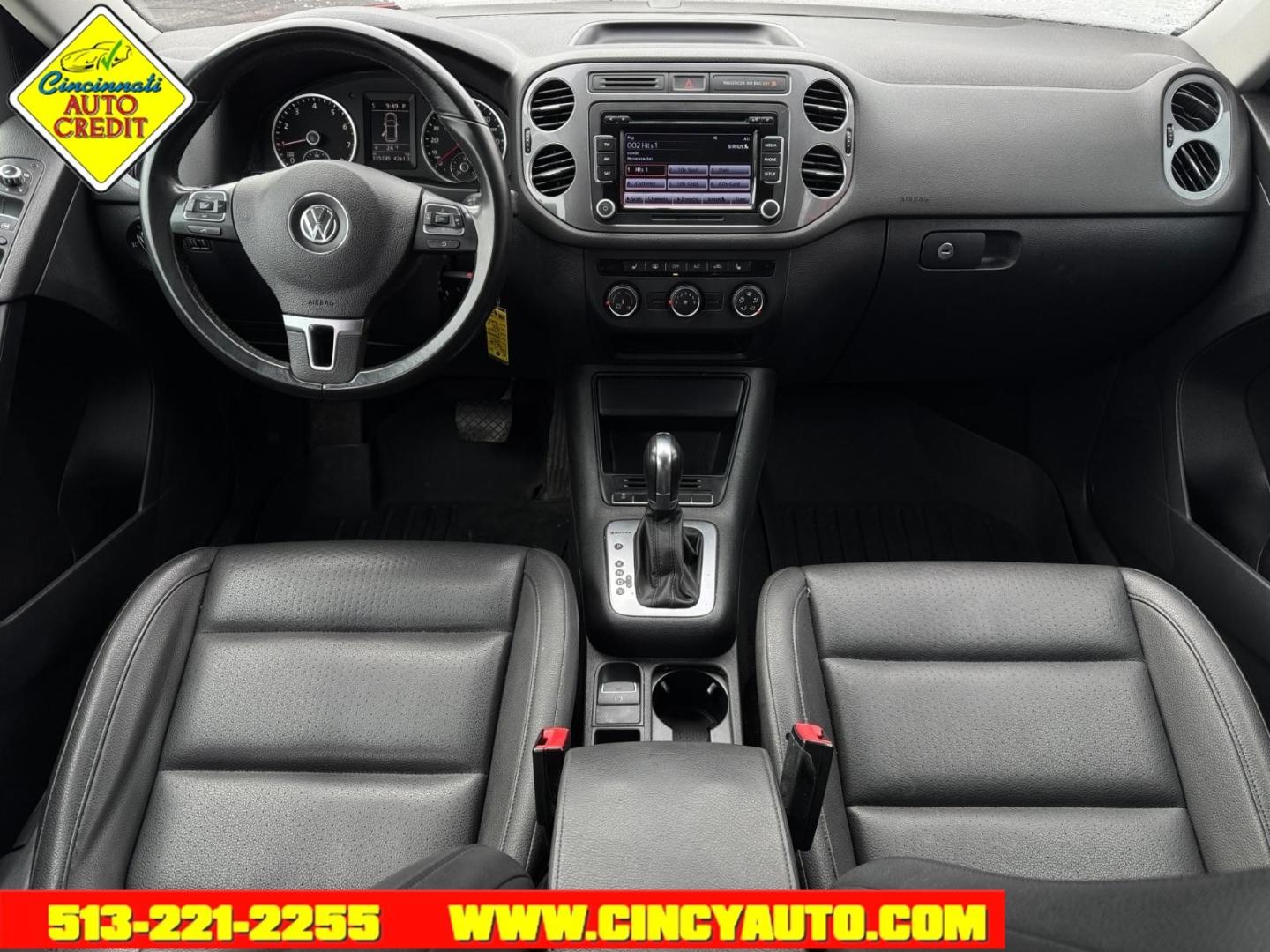 2013 Wild Cherry Metallic Volkswagen Tiguan SEL 4Motion (WVGBV3AX1DW) with an 2.0L 2.0L Turbo I4 200hp 207ft. lbs. Direct Injection engine, 6-speed Automatic with Tiptronic transmission, located at 2813 Gilbert Avenue, Cincinnati, OH, 45206, (513) 221-2255, 39.130219, -84.489189 - Photo#3