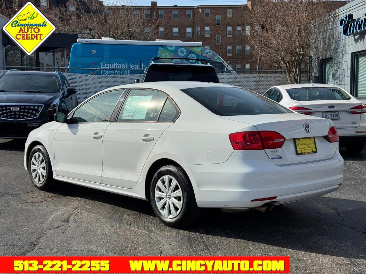 2013 Candy White Volkswagen Jetta Base (3VW2K7AJ3DM) with an 2.0L 2.0L I4 115hp 125ft. lbs. Fuel Injected engine, 6-Speed Shiftable Automatic transmission, located at 2813 Gilbert Avenue, Cincinnati, OH, 45206, (513) 221-2255, 39.130219, -84.489189 - Photo#2