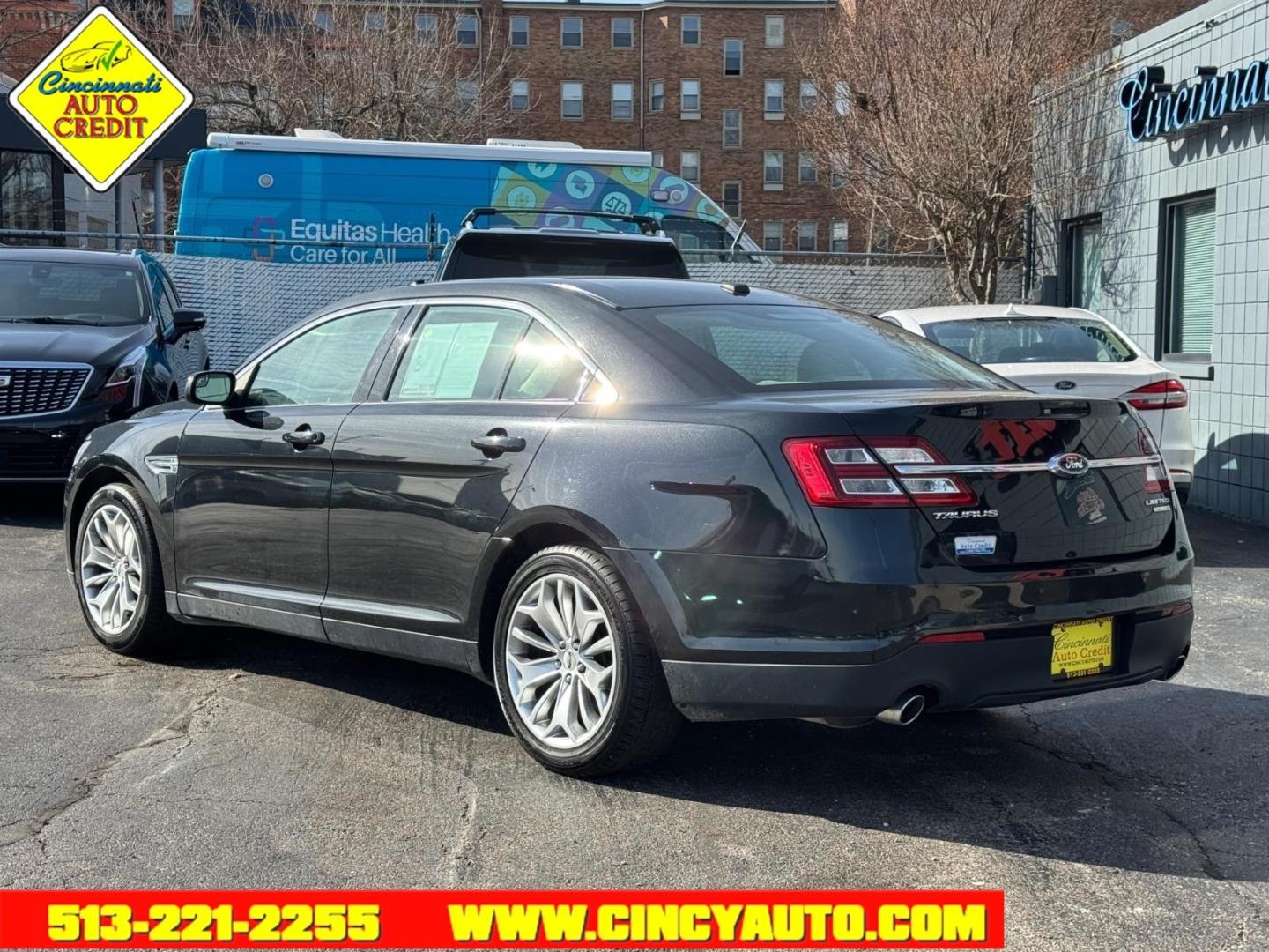 2015 Tuxedo Black Metallic Ford Taurus Limited (1FAHP2F84FG) with an 3.5L 3.5L V6 288hp 254ft. lbs. Sequential Multiport Fuel Injection engine, 6-Speed Shiftable Automatic transmission, located at 2813 Gilbert Avenue, Cincinnati, OH, 45206, (513) 221-2255, 39.130219, -84.489189 - Photo#2