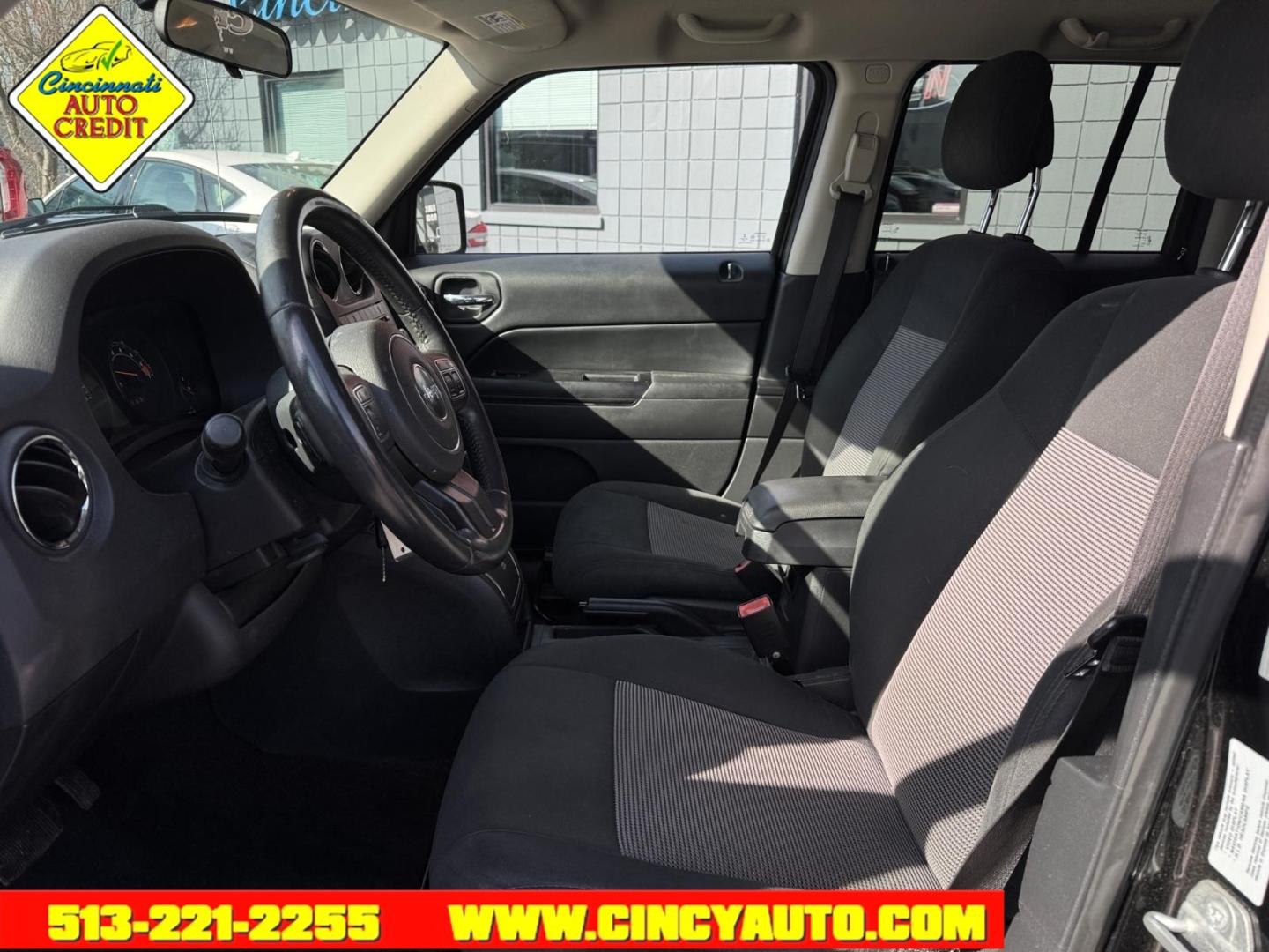 2014 Black Clear Coat Jeep Patriot Latitude (1C4NJPFB0ED) with an 2.4L 2.4L I4 172hp 165ft. lbs. Sequential Multiport Fuel Injection engine, 6-Speed Shiftable Automatic transmission, located at 2813 Gilbert Avenue, Cincinnati, OH, 45206, (513) 221-2255, 39.130219, -84.489189 - Photo#5