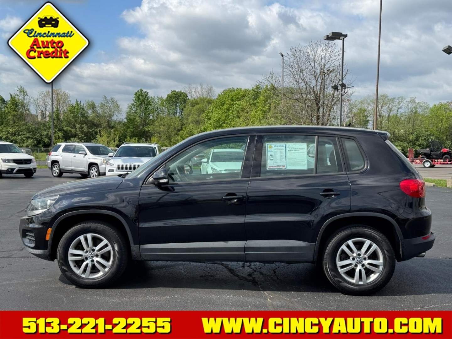 2014 Deep Black Metallic 2t2t Volkswagen Tiguan S (WVGAV3AX7EW) with an 2.0L 2.0L Turbo I4 200hp 207ft. lbs. Direct Injection engine, 6-speed Automatic with Tiptronic transmission, located at 5489 Dixie Highway, Fairfield, OH, 45014, (513) 221-2255, 39.333084, -84.523834 - Photo#1