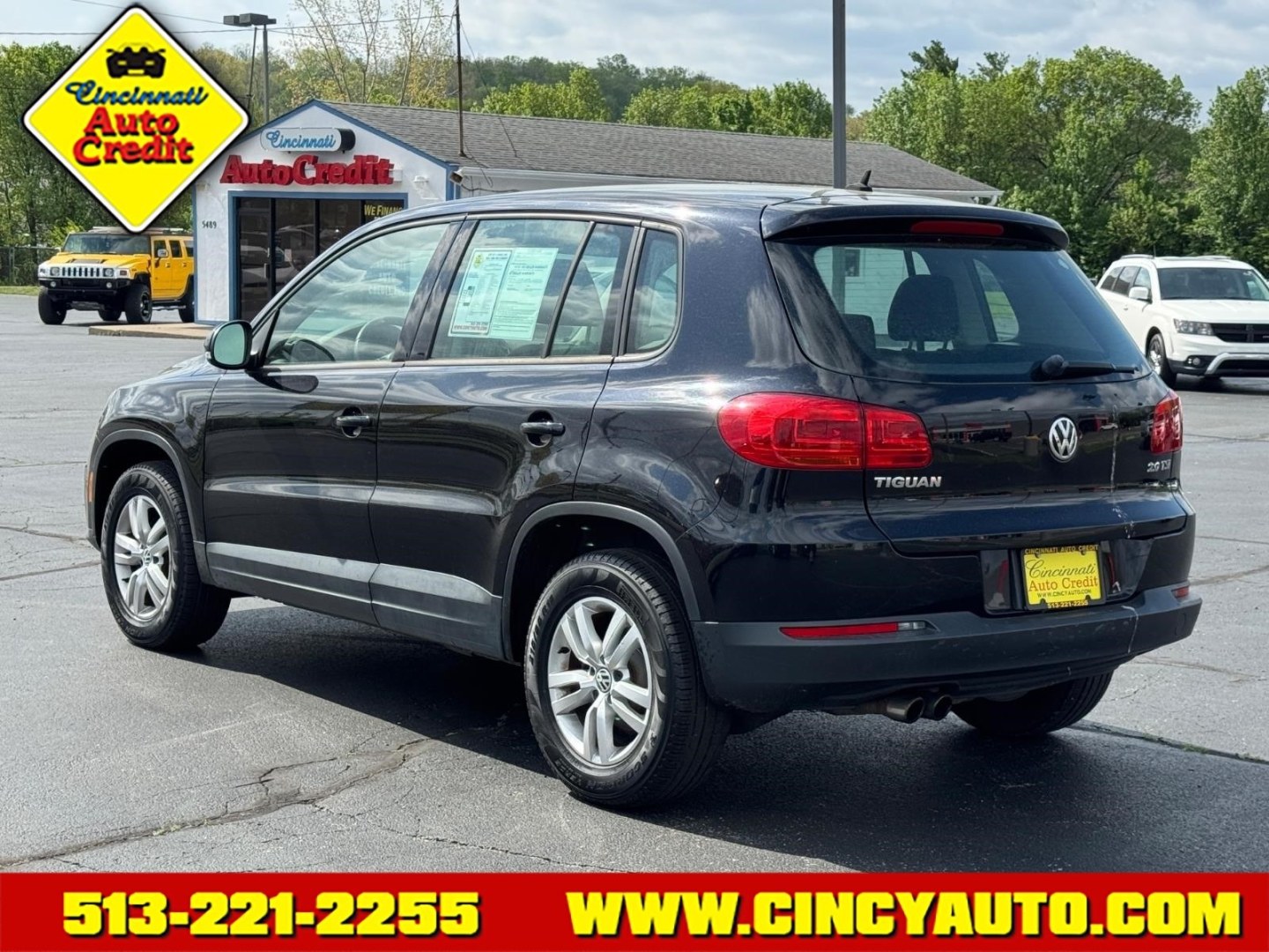 2014 Deep Black Metallic 2t2t Volkswagen Tiguan S (WVGAV3AX7EW) with an 2.0L 2.0L Turbo I4 200hp 207ft. lbs. Direct Injection engine, 6-speed Automatic with Tiptronic transmission, located at 5489 Dixie Highway, Fairfield, OH, 45014, (513) 221-2255, 39.333084, -84.523834 - Photo#2