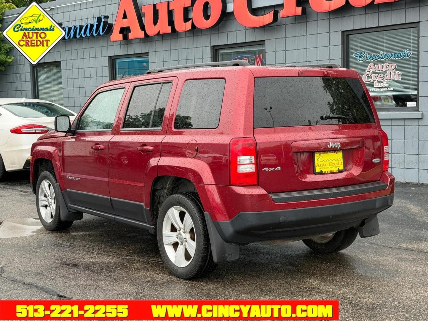 2013 Deep Cherry Red Crystal Pearl Coat Prp Jeep Patriot Latitude (1C4NJRFB1DD) with an 2.4L 2.4L I4 172hp 165ft. lbs. Sequential Multiport Fuel Injection engine, CVT transmission, located at 2813 Gilbert Avenue, Cincinnati, OH, 45206, (513) 221-2255, 39.130219, -84.489189 - Photo#2