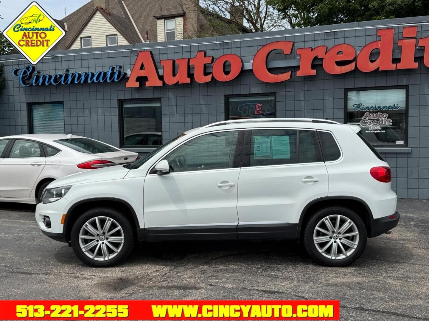 2015 Pure White 0q0q Volkswagen Tiguan SEL 4Motion (WVGBV7AX5FW) with an 2.0L 2.0L Turbo I4 200hp 207ft. lbs. Direct Injection engine, 6-speed Automatic with Tiptronic transmission, located at 2813 Gilbert Avenue, Cincinnati, OH, 45206, (513) 221-2255, 39.130219, -84.489189- Photo#1