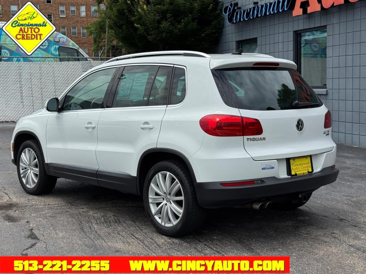2015 Pure White 0q0q Volkswagen Tiguan SEL 4Motion (WVGBV7AX5FW) with an 2.0L 2.0L Turbo I4 200hp 207ft. lbs. Direct Injection engine, 6-speed Automatic with Tiptronic transmission, located at 2813 Gilbert Avenue, Cincinnati, OH, 45206, (513) 221-2255, 39.130219, -84.489189- Photo#2