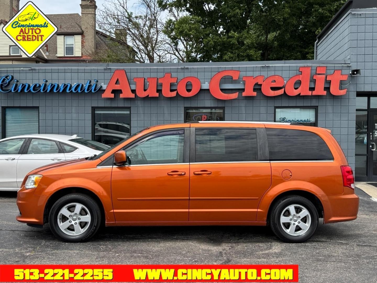 2011 Mango Tango Pearl Coat Pvg Dodge Grand Caravan Crew (2D4RN5DG7BR) with an 3.6L Pentastar 3.6L Flex Fuel V6 283hp 260ft. lbs. Sequential Multiport Fuel Injection engine, 6-Speed Shiftable Automatic transmission, located at 2813 Gilbert Avenue, Cincinnati, OH, 45206, (513) 221-2255, 39.130219, -84.489189- Photo#1