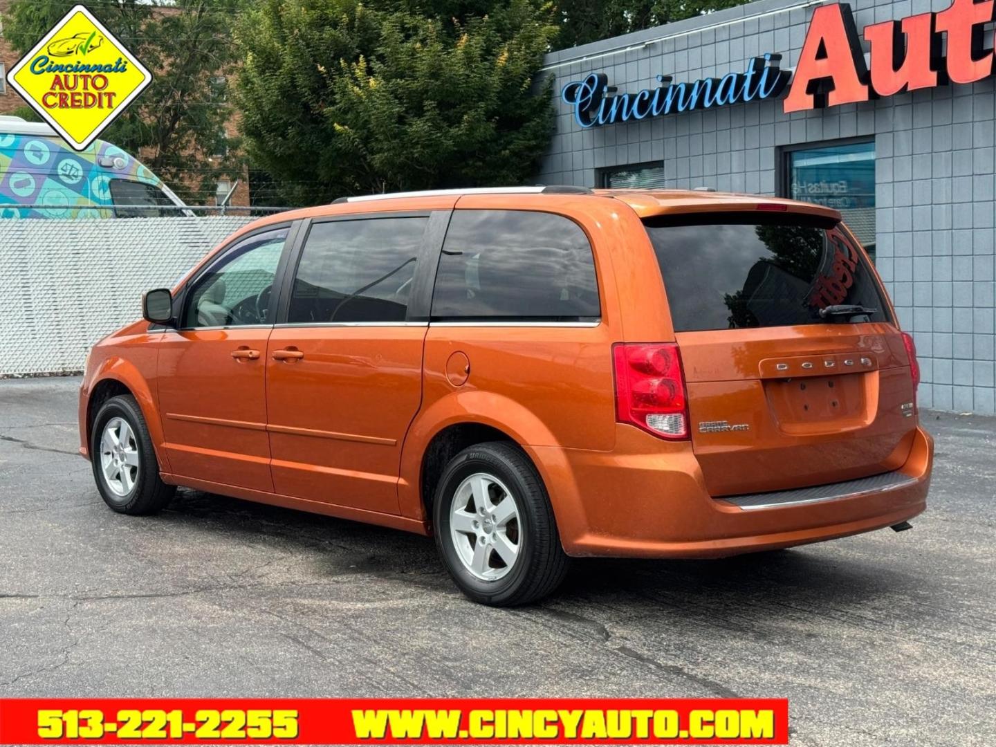 2011 Mango Tango Pearl Coat Pvg Dodge Grand Caravan Crew (2D4RN5DG7BR) with an 3.6L Pentastar 3.6L Flex Fuel V6 283hp 260ft. lbs. Sequential Multiport Fuel Injection engine, 6-Speed Shiftable Automatic transmission, located at 2813 Gilbert Avenue, Cincinnati, OH, 45206, (513) 221-2255, 39.130219, -84.489189- Photo#2