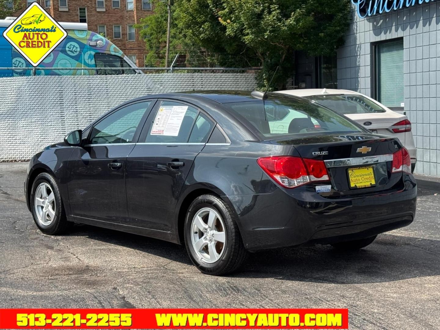 2015 Black Granite Metallic Gar Chevrolet Cruze 1LT Auto (1G1PC5SB2F7) with an 1.4L Ecotec 1.4L Turbo I4 138hp 148ft. lbs. Sequential Multiport Fuel Injection engine, 6-Speed Shiftable Automatic w/Overdrive transmission, located at 2813 Gilbert Avenue, Cincinnati, OH, 45206, (513) 221-2255, 39.130219, -84.489189- Photo#2