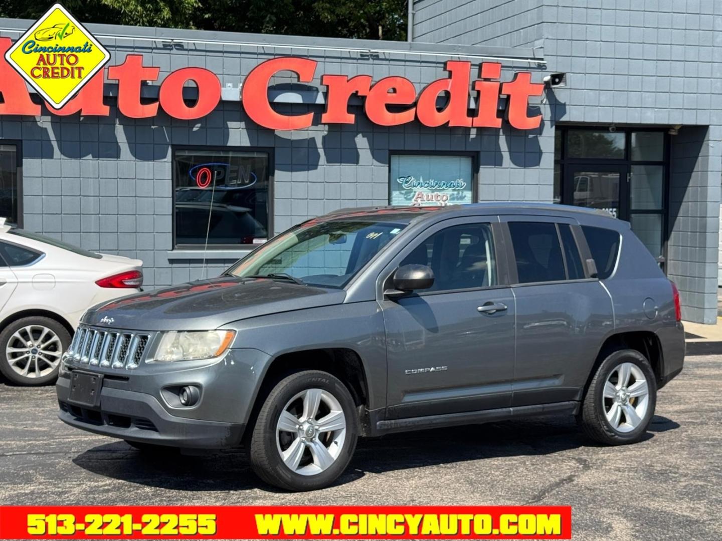 2013 Mineral Gray Metallic Clear Coat Jeep Compass Latitude (1C4NJDEB8DD) with an 2.4L 2.4L I4 172hp 165ft. lbs. Sequential Multiport Fuel Injection engine, CVT transmission, located at 2813 Gilbert Avenue, Cincinnati, OH, 45206, (513) 221-2255, 39.130219, -84.489189- Photo#0
