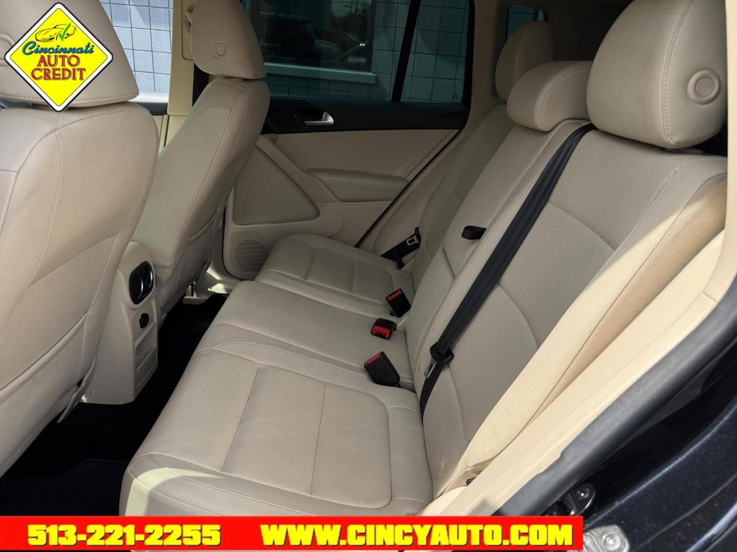2015 Deep Black Pearl Metallic Volkswagen Tiguan SEL (WVGAV7AX7FW) with an 2.0L 2.0L Turbo I4 200hp 207ft. lbs. Fuel Injected engine, 6-speed Automatic with Tiptronic transmission, located at 2813 Gilbert Avenue, Cincinnati, OH, 45206, (513) 221-2255, 39.130219, -84.489189- Photo#4