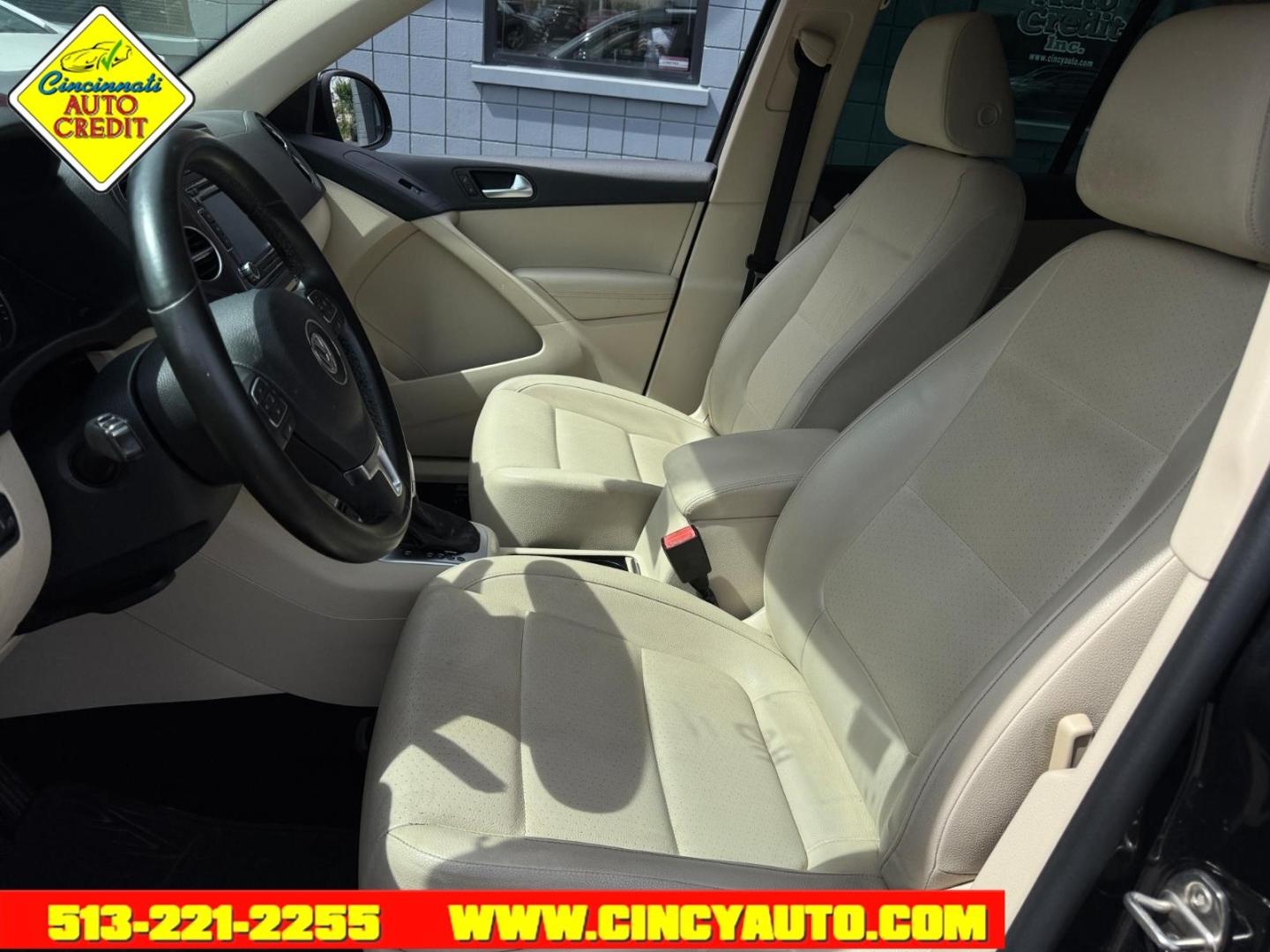 2015 Deep Black Pearl Metallic Volkswagen Tiguan SEL (WVGAV7AX7FW) with an 2.0L 2.0L Turbo I4 200hp 207ft. lbs. Fuel Injected engine, 6-speed Automatic with Tiptronic transmission, located at 2813 Gilbert Avenue, Cincinnati, OH, 45206, (513) 221-2255, 39.130219, -84.489189- Photo#5