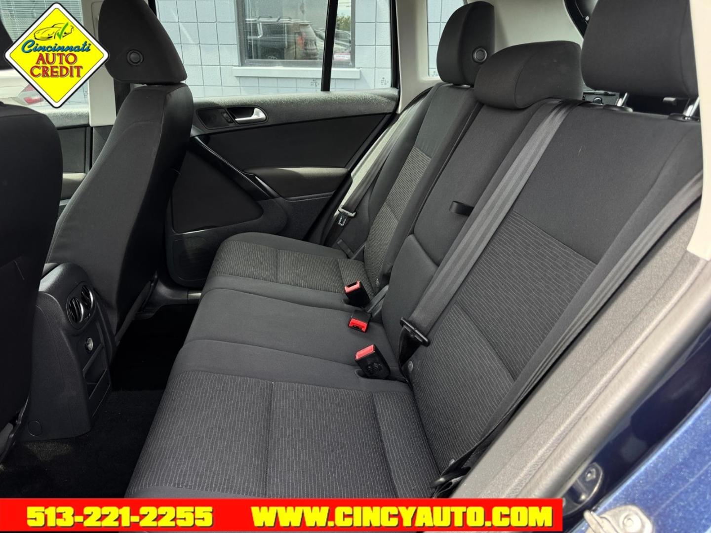 2015 Night Blue Metallic Volkswagen Tiguan S (WVGAV7AX7FW) with an 2.0L 2.0L Turbo I4 200hp 207ft. lbs. Fuel Injected engine, 6-speed Automatic with Tiptronic transmission, located at 2813 Gilbert Avenue, Cincinnati, OH, 45206, (513) 221-2255, 39.130219, -84.489189- Photo#4