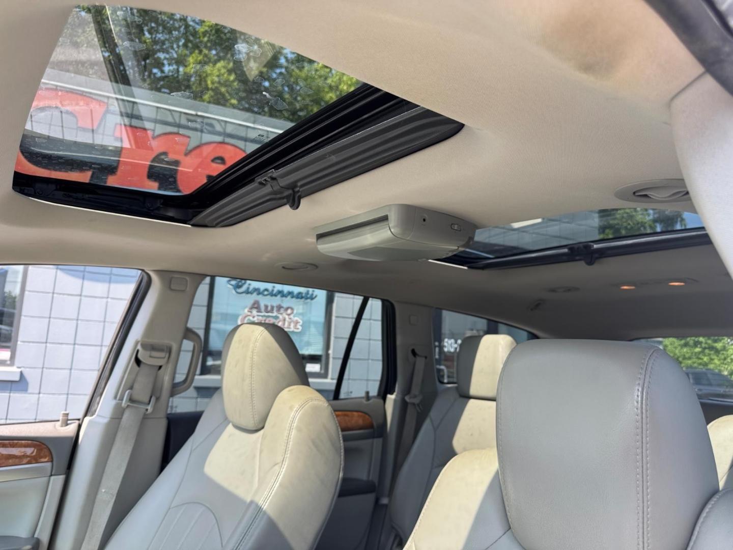 2012 Quicksilver Metallic Buick Enclave Leather (5GAKVCED4CJ) with an 3.6L 3.6L V6 288hp 270ft. lbs. Direct Injection engine, 6-Speed Shiftable Automatic transmission, located at 2813 Gilbert Avenue, Cincinnati, OH, 45206, (513) 221-2255, 39.130219, -84.489189- Photo#6