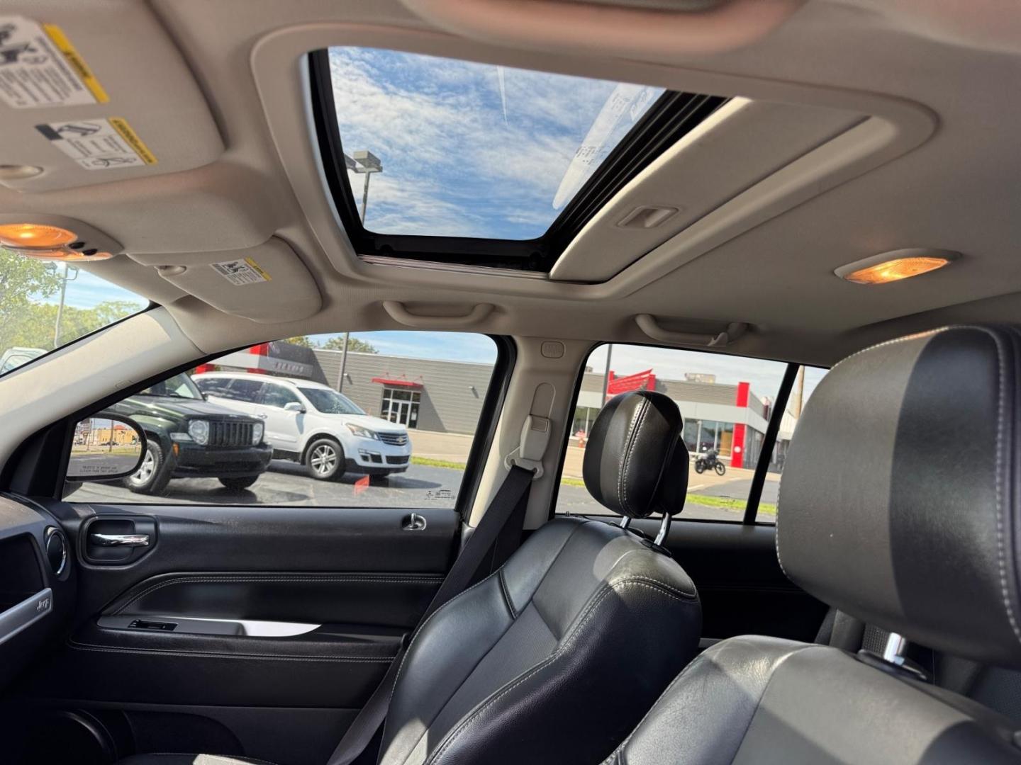 2015 Granite Crystal Metallic Clear Coat Pau Jeep Compass High Altitude Edition (1C4NJCEA2FD) with an 2.0L 2.0L I4 158hp 141ft. lbs. Fuel Injected engine, CVT transmission, located at 5489 Dixie Highway, Fairfield, OH, 45014, (513) 221-2255, 39.333084, -84.523834- Photo#6